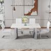 Modern minimalist dining table. White imitation marble glass sticker desktop, stainless steel legs