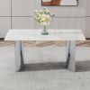 Modern minimalist dining table. White imitation marble glass sticker desktop, stainless steel legs
